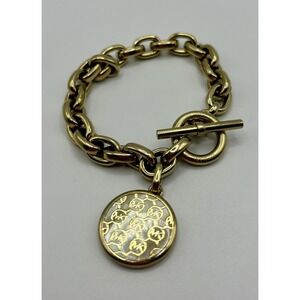 MICHAEL KORS Gold Tone Toggle Bracelet MK Monogram Disk